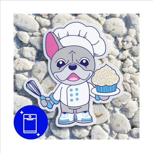 Cute chef dog sticker and the dog is holding a cupcake.